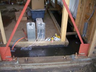 [Electrical and structured wiring in Living room South wall prior to straw bales]