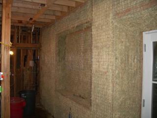 [Master bedroom straw bale wall before plaster]