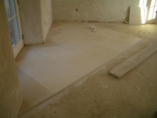 [First floor limestone tiling started]